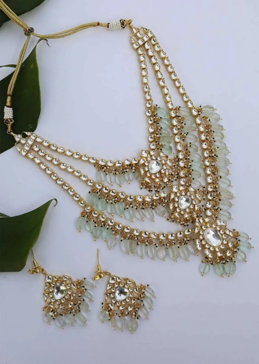 Mint And Gold Layered Necklace Set Adorned In Kundan Work In Floral Motifs, Pearls And Aquamarine Stones By Paisley Pop