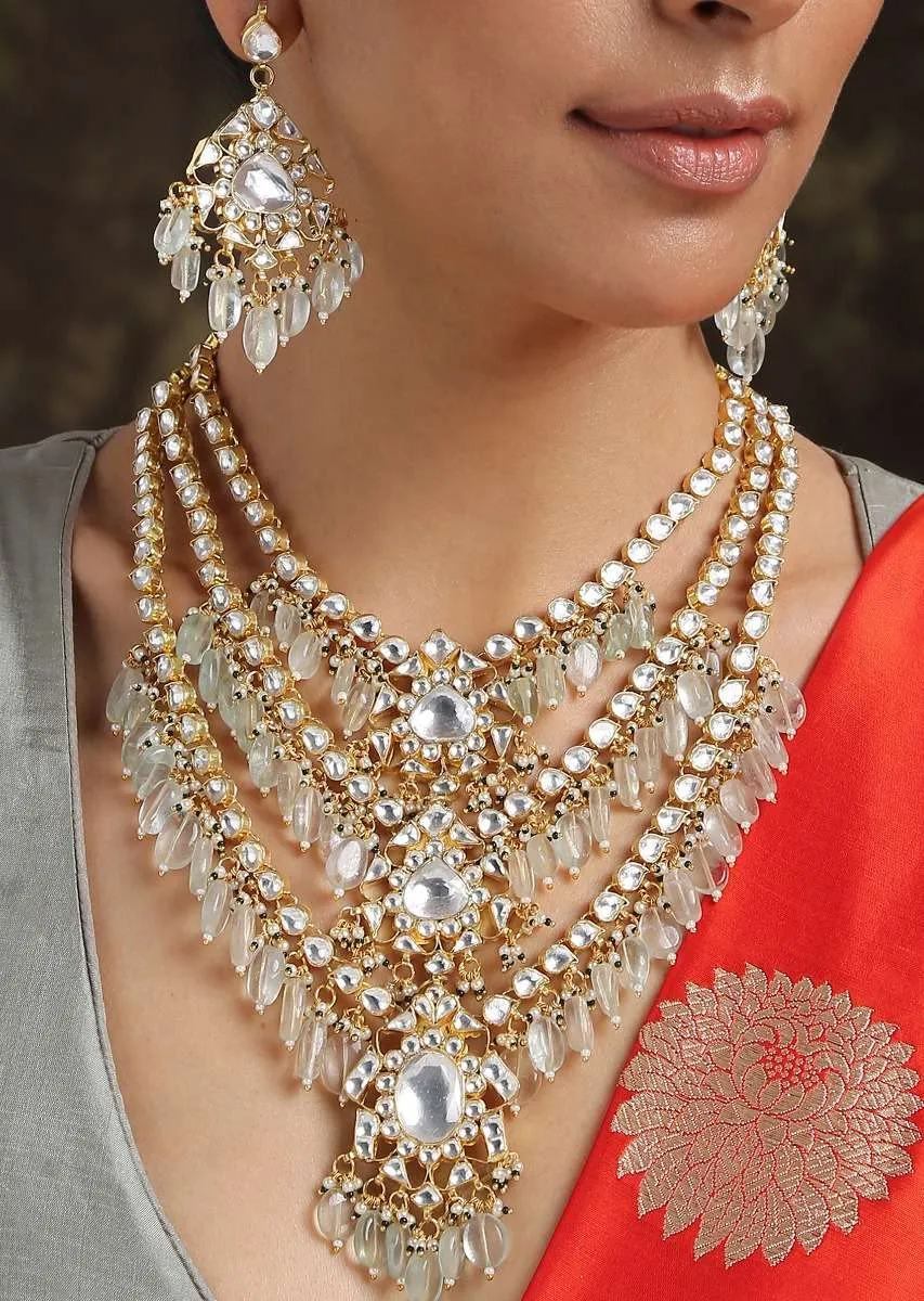 Mint And Gold Layered Necklace Set Adorned In Kundan Work In Floral Motifs, Pearls And Aquamarine Stones By Paisley Pop